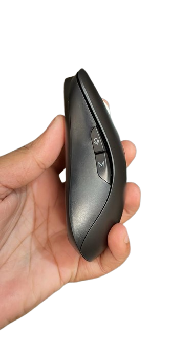 Hand holding a black electronic device with buttons on a white background