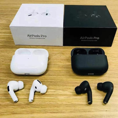 AirPods Pro with white and black charging cases on a wooden surface